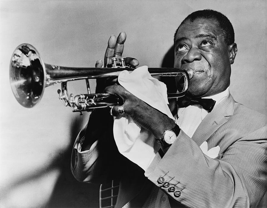 Louis Armstrong with his trumpet